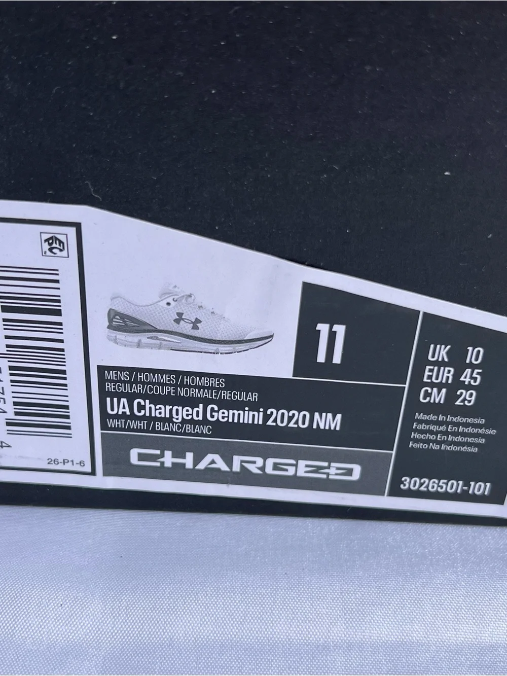 Under Armour (UA Charged Gemini) Mens White and Black Athletic Sneakers
